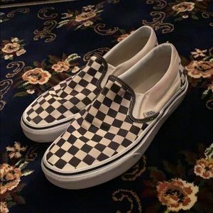 Women’s checkers slip on vans
